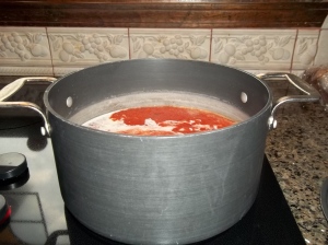 Tomatoe basil soup in the stock pot